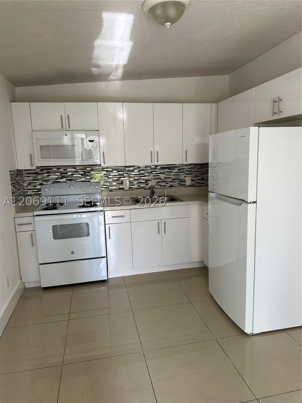 Photo of 2222 Van Buren St #D-12, Hollywood, FL 33020 (MLS # A12069111)