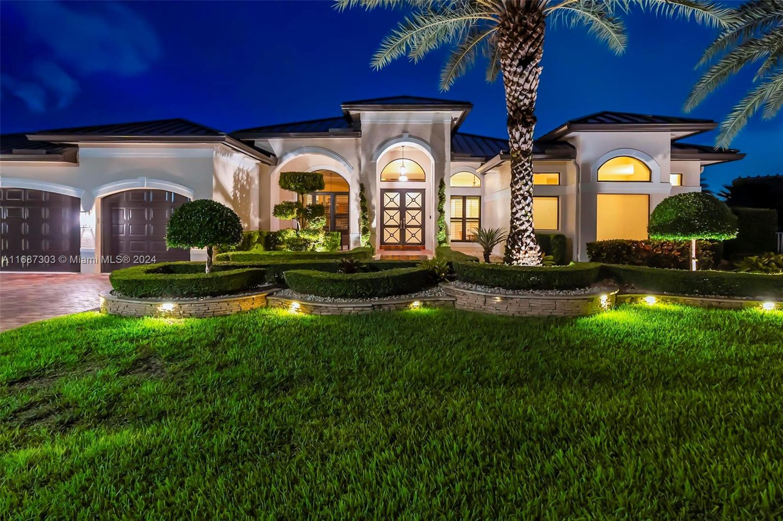 This luxury home is nestled in the prestigious guard-gated Sunset Lakes community, offering resort-style living with a private sanctuary feel. This stunning one-story residence overlooks an expansive lake and features a brand new metal roof along with hurricane impact windows, doors and upgrades throughout. The highly sought-after Caliterra model boasts a triple split floor plan with 5 bedrooms, an office, 3.5 baths, and a 3 car garage. Enjoy custom landscaping in both the front and backyard, highlighted by a beautiful pool, a covered sitting area, and a modern pergola. This impeccably maintained home is located on a tranquil cul-de-sac, on one of the largest double buildable lots in Miramar. This gem won’t last!