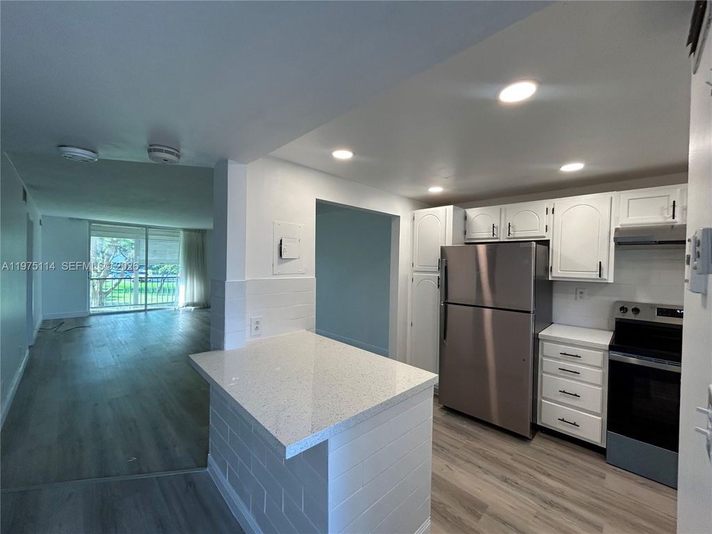 Photo of 8962 S Hollybrook Blvd #202, Pembroke Pines, FL 33025 (MLS # A11975114)