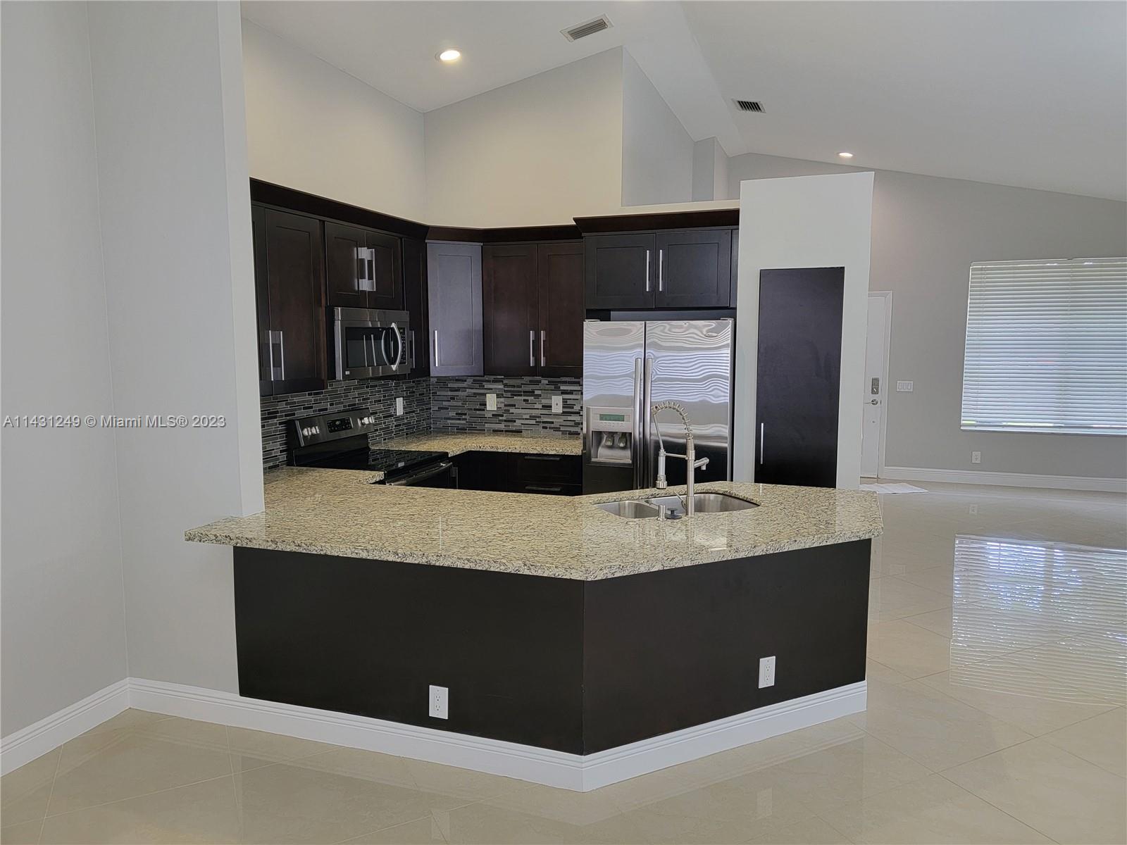 ***BEAUTIFUL PROPERTY ALERT*** GORGEOUS OPEN CONCEPT KITCHEN W/ GRANITE COUNTER TOP, STAINLESS STEEL APPLIANCES, PORCELAIN TILE, UPGRADED BATHROOMS, 2-CAR GARAGE, A/C 2018 and accordion shutters. House features a custom-made pergola perfect for entertaining your guests and enjoying your morning coffee in the shade. A-rated Weston schools in a gated community that includes pool and playground. Very easy to show. Won't last!