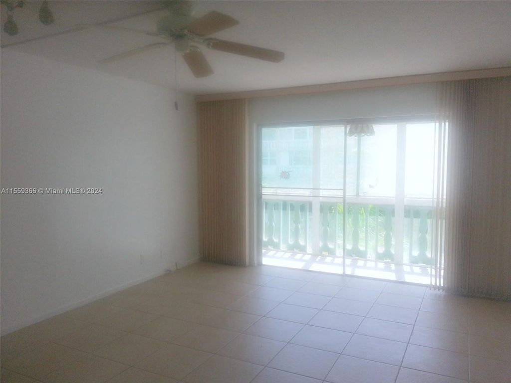 Photo of 233 NE 14th Ave #303, Hallandale Beach, FL 33009 (MLS # A11559366)