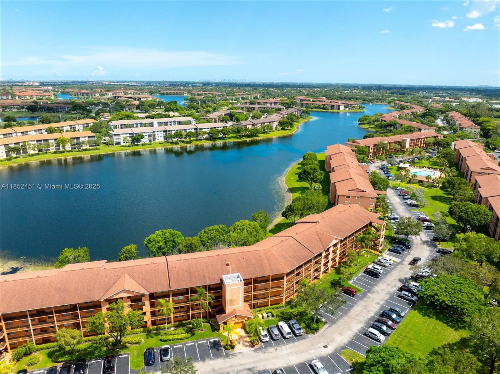 Resort-style living awaits in this beautifully renovated 2 bed, 2 bath waterfront condo! Features include a modern kitchen, updated baths, newer A/C, appliances, in-unit washer/dryer, laminate floors, and balcony with added sliders to enjoy with AC. Zebra blinds with blackout shades, freshly painted. 1 assigned parking + guest spots. Located in a 55+ guard-gated community with pools, clubhouse, gyms, tennis & more. Cable, internet, and water included. No special assessments; reserves in budget. New elevator in building. Financing available with 5% down (650+ credit score). Occupants 18+ welcome!