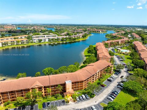 Photo of 571 SW 141st Ave #205N, Pembroke Pines, FL 33027 (MLS # A11852451)
