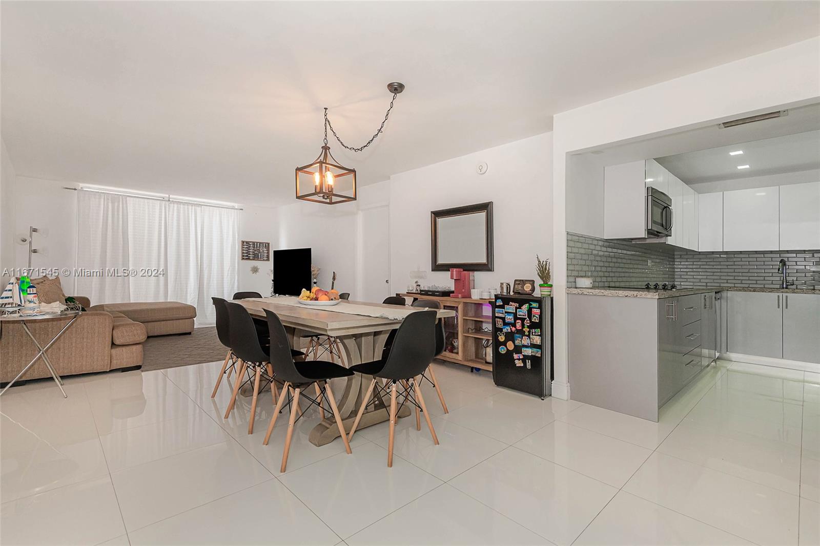 Rarely available and highly sought-after "Direct Pool & Ocean Access" unit at Maison Grande. With only five units boasting a private balcony that opens to a walkway leading
directly to the terrace, pool, and beach, you can enjoy direct access without ever passing through the building. This beautifully updated 2-bedroom, 2-bathroom residence
showcases tasteful upgrades, including granite countertops and a blend of ceramic and wood laminate flooring. The master bedroom is a haven of storage with three spacious
closets—two walk-in and one wall closet. Perfectly situated in a prime location, this property is centrally located, offering easy access to all essential amenities and just moments
from the vibrant heart of South Beach