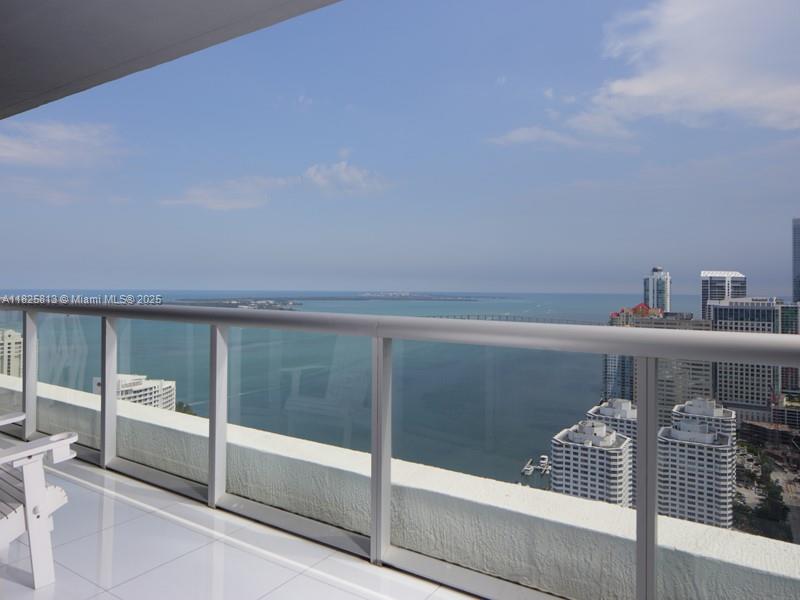 Discover luxury living at its finest in this impeccably designed 2-bedroom, 2-bathroom residence at Icon Brickell Tower II. Showcasing stunning floor-to-ceiling windows, the unit boasts unobstructed views of Biscayne Bay and the Atlantic Ocean. this sleek, modern home features:
    •    Brand new Miele appliances, including refrigerator, washer, and dryer
    •    Elegant granite countertops
    •    Motorized electronic blinds
Residents enjoy access to world-class amenities, including a 5-star spa, state-of-the-art fitness center, and renowned dining options such as Cipriani and La Cantina Veinte. Icon Brickell also offers on-site cafés and lounges, all within a vibrant, walkable neighborhood steps from Whole Foods, Brickell City Centre, and the best of downtown Miami.