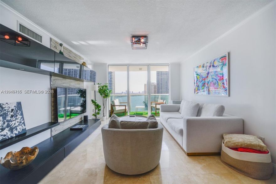 Brickell on the River north tower best corner line 2-bedroom with NE river & bay views. 2 balconies for sunrise and sunset views. Marble floors, granite countertops, open kitchen, spacious master bath, custom doors. Five stories of amenities include 2 pools, gym, sauna, whirlpool, BBQ deck area, business center, restaurants, grocery store & riverfront bay walk. Steps to free Metro Mover, Brickell City Center & downtown bridge. 1 x Garage parking and valet with 3 deeded additional storage spaces in bldg. Waterfront building with boat dock for pick up & drop off.