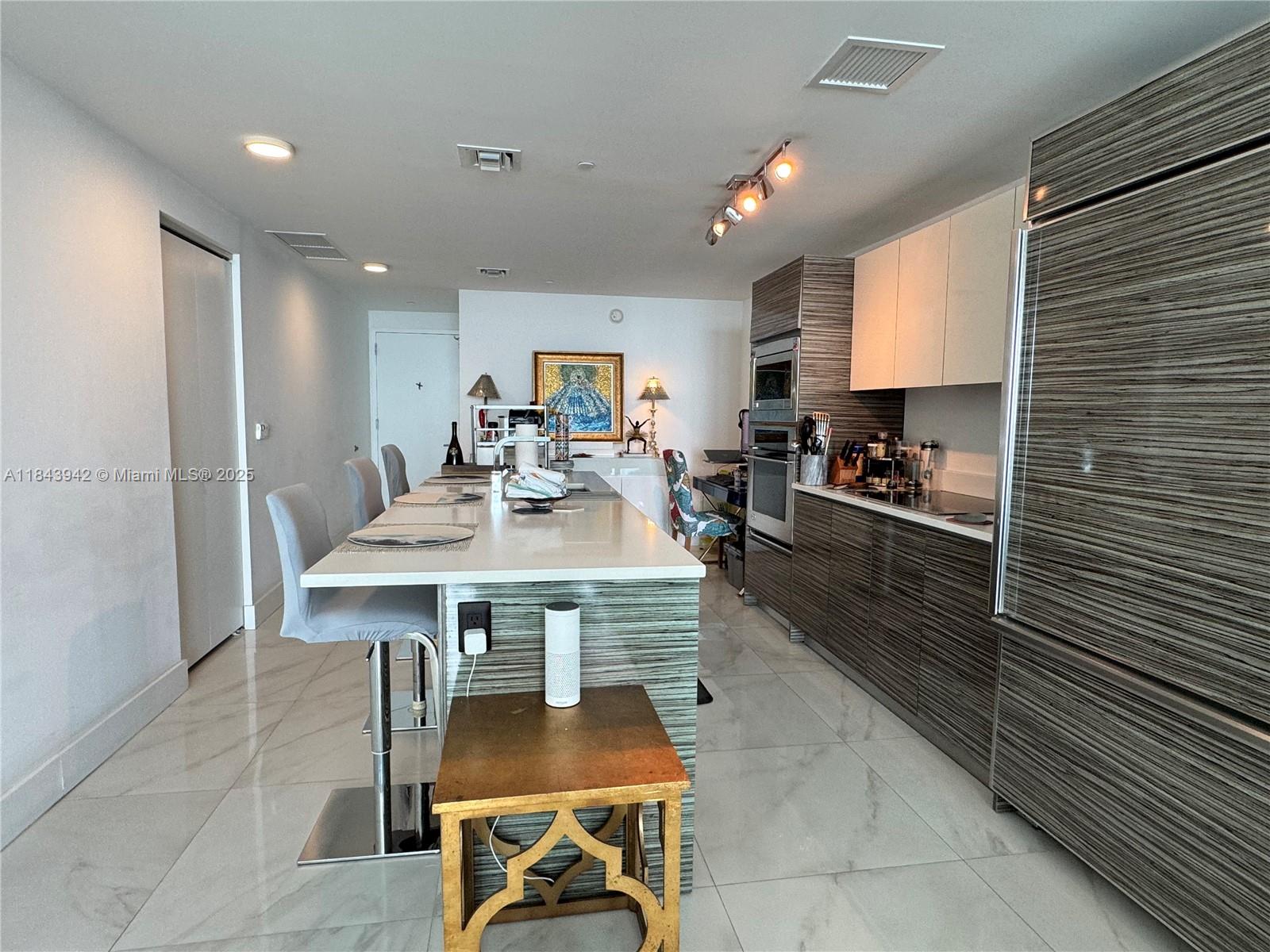 Exceptional Oceanfront residence in Edgewater's Icon Bay, minutes from Midtown, Wynwood and Brickell. This very spacious apartment features private foyer, expansive dinning and living area with breathtaking ocean views from all angles. The building offers luxurious amenities such as gym, social clubs, dog park, theater, pools and more.