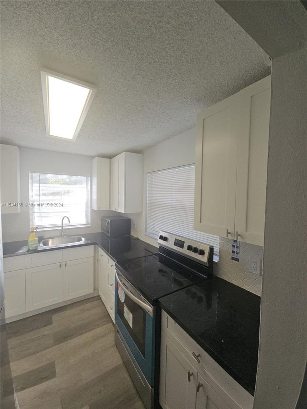 Photo of 401 SE 23rd Ave #C, Boynton Beach, FL 33435 (MLS # A11594168)