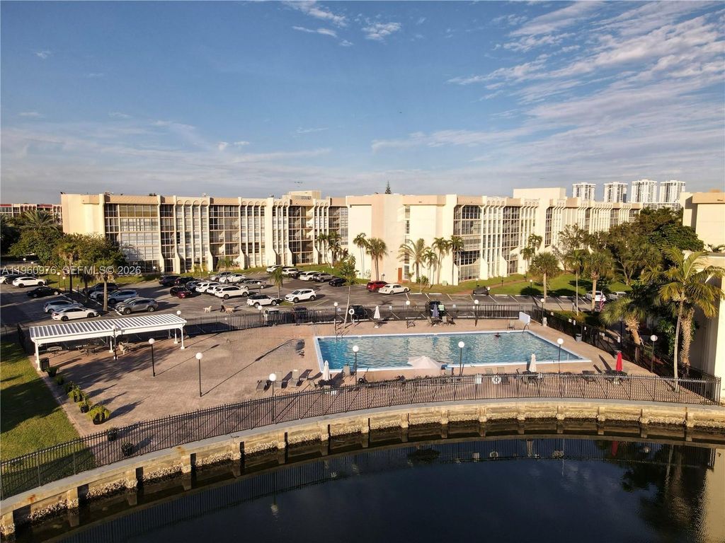 Photo of 701 Three Islands Blvd #110, Hallandale Beach, FL 33009 (MLS # A11960976)