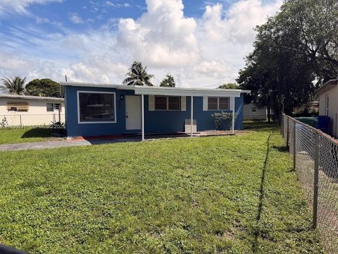Photo of 318 NW 30th Terrace, Fort Lauderdale, FL 33311 (MLS # A11935241)