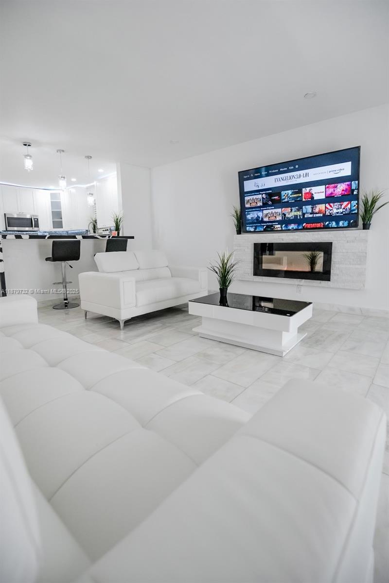 Gorgeous 3/2 w/ Hot tub! AVAILABLE DEC 1! Nicely rennovated inside with SS Appliances, Marble floors and counters, W/D, Central AC, and extra AC for the large master bedroom. The home has a MASSIVE master bedroom in the back of the home with lots of natural lighting and private entry. LARGE storage & laundry room which can be a rec room. Backyard is fully fenced & private w/ SPACIOUS concrete area for any outdoor activities, grass space for furry friends, BBQ, and a jaccuzzi lifted gazebo! Located just a block south of Biscayne park and NW of the Miami Shores Country club, you will have access to dining and shopping down along Biscayne blvd and 6th Ave, and best of all NE 2nd Ave! You will fall in love with the neighborhood and become a local at the beautiful nearby restaurants!