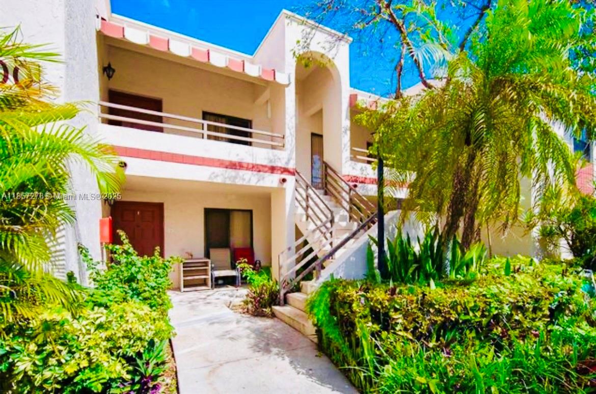 QUATRAINE CONDO III - Residential Lease