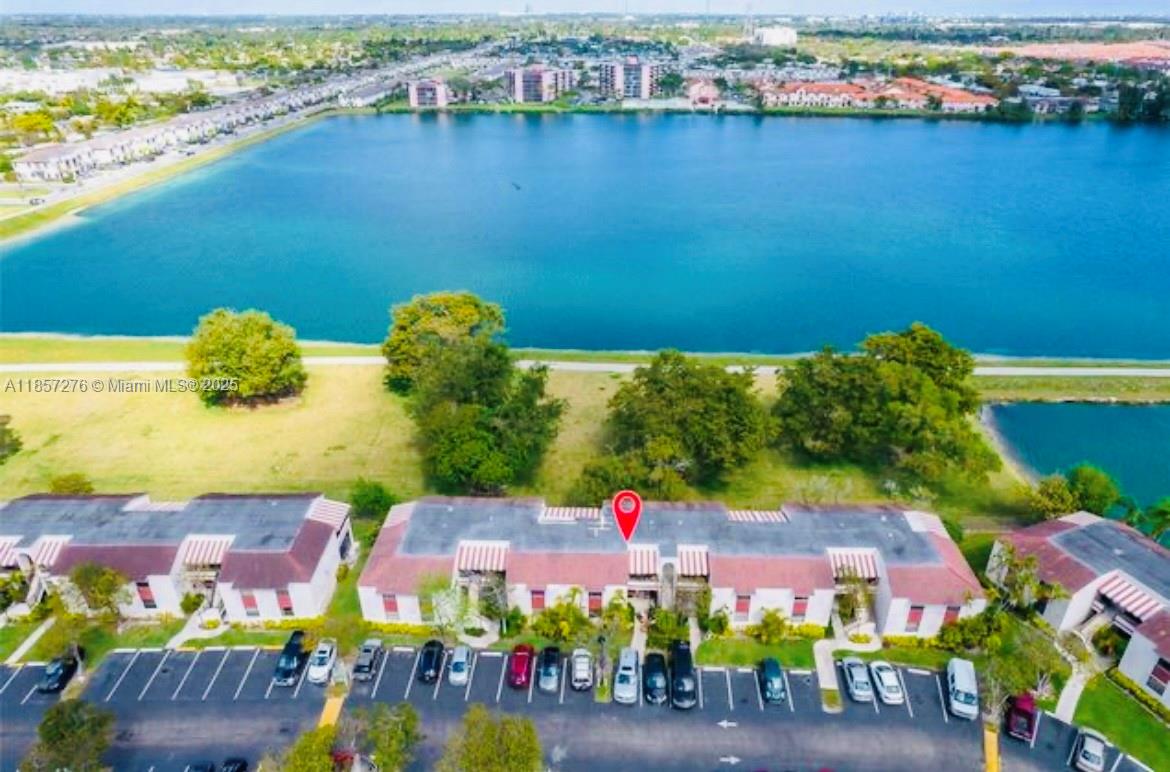 QUATRAINE CONDO III - Residential Lease