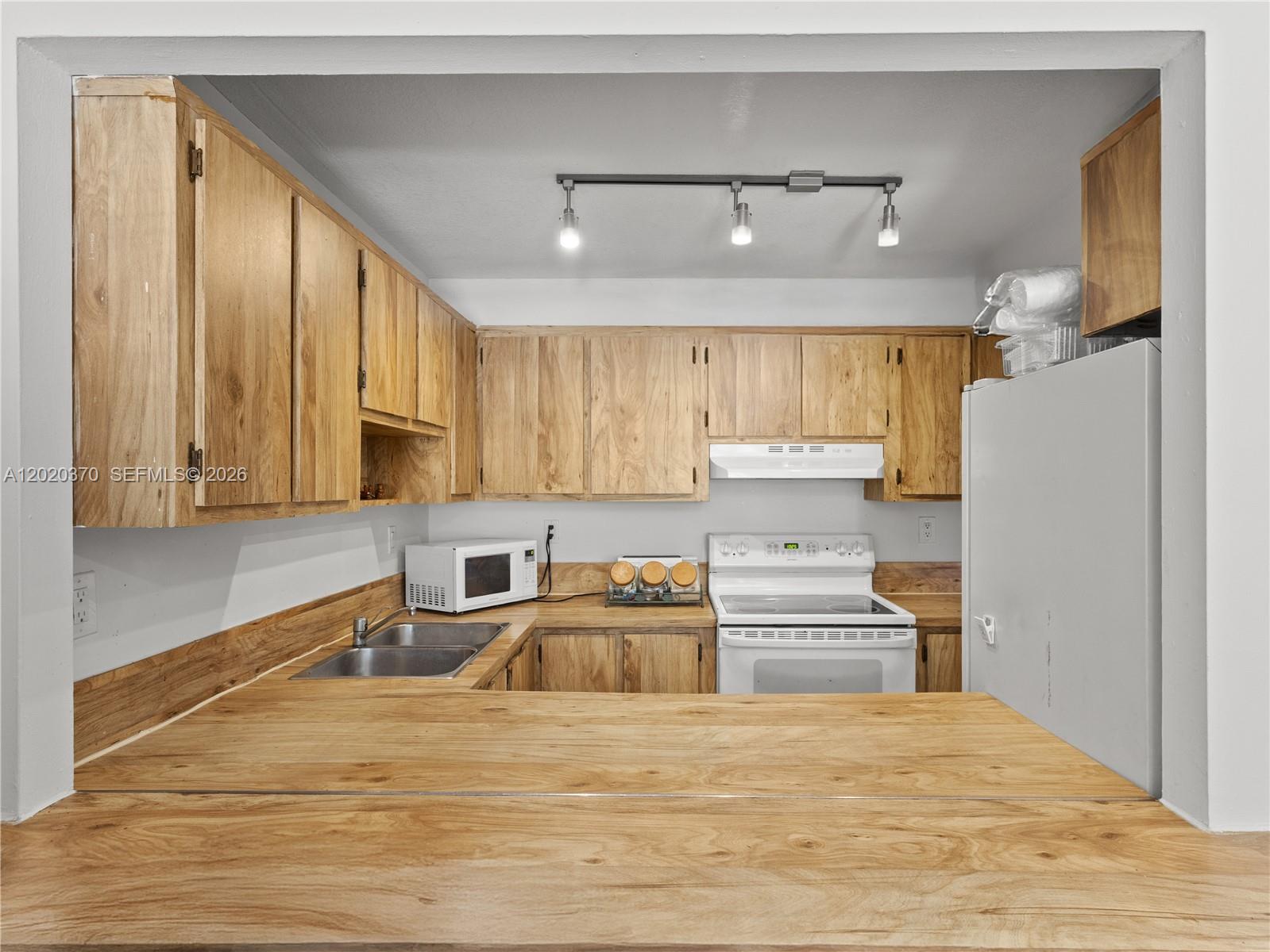 WISPERWOOD VILLAGE CONDO - Residential