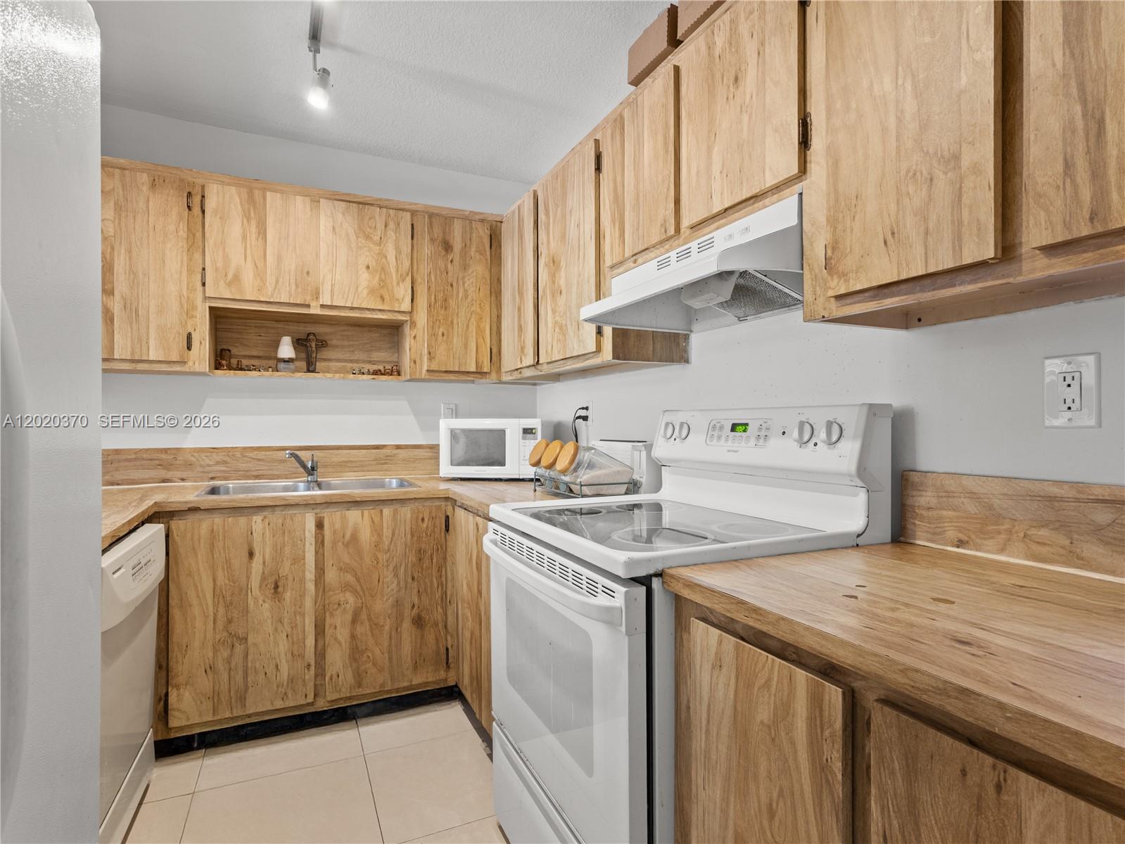 WISPERWOOD VILLAGE CONDO - Residential