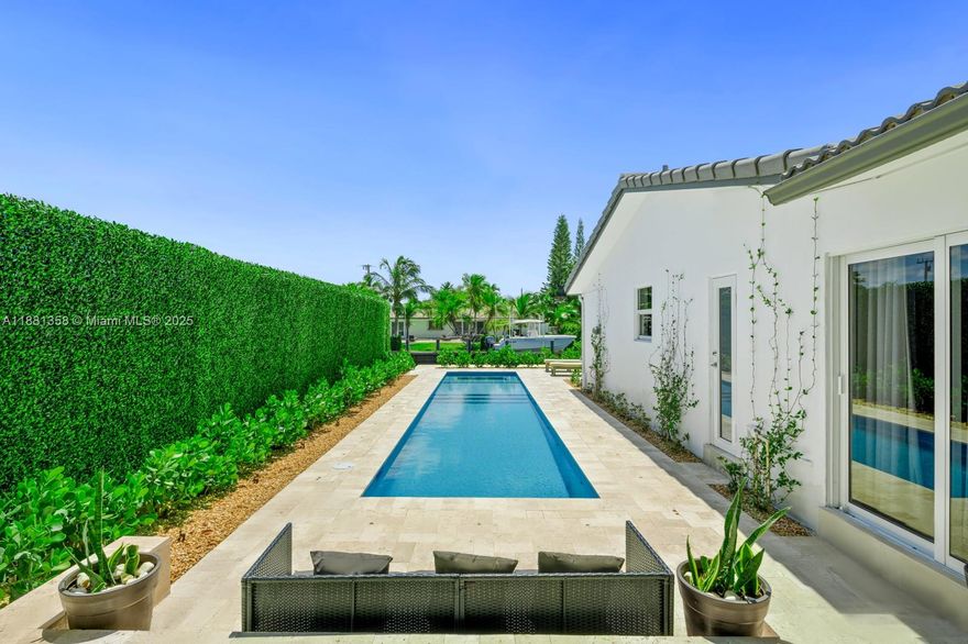 Brand-new roof with 10-year warranty,new seawall,and impact windows and doors 
Experience luxurious waterfront living in this fully renovated 4-bed,4-bath residence, offering over 2,500 sqft. of refined elegance. With direct ocean access and a brand-new seawall along the Intracoastal Waterway, this home is designed for both comfort and peace of mind.
An automated heated pool with a custom mosaic by world-renowned Mosaicist, a spacious 2car garage, and a grand master with a walk-in closet. Situated on a quiet cul-de-sac, the property ensures ultimate privacy.
Over $500,000 in upgrades, including a new deck, lush landscaping, hot tub, state-of-the-art pool system, and more. Located near top-rated schools such as Pinecrest and Westminster, this is a rare turnkey waterfront gem.