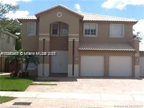 11390 Nw 61st St, Doral, Miami-Dade County, Florida - 5 Bedrooms  
3 Bathrooms - 