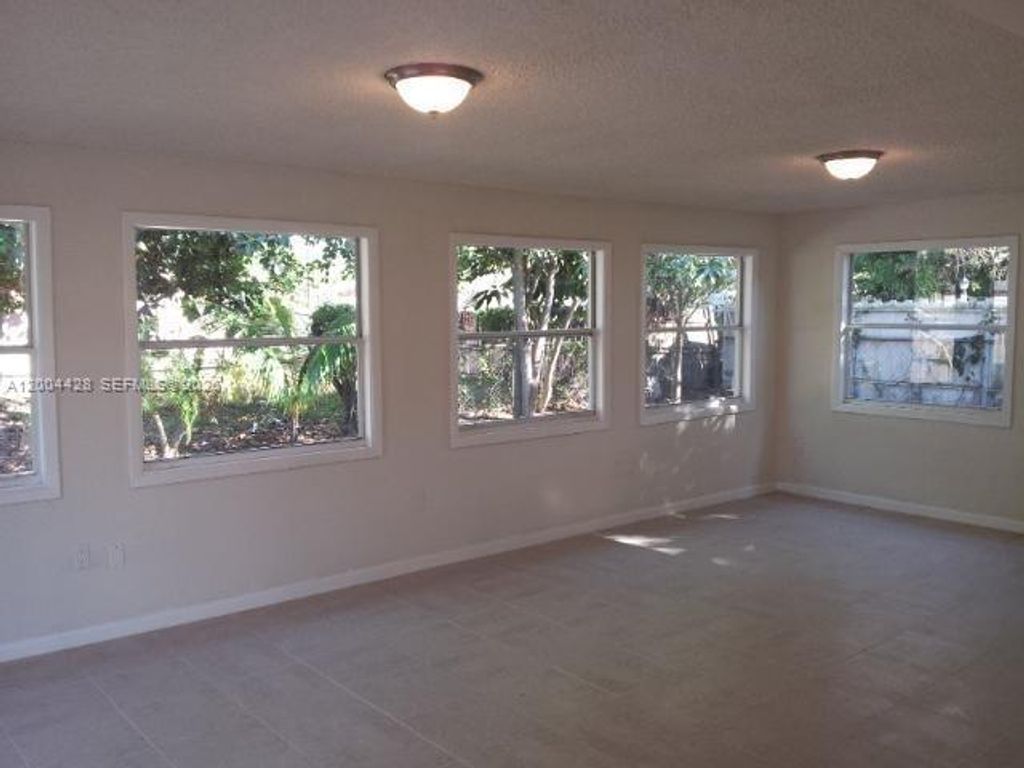 Photo of 5970 NW 42nd Ter, North Lauderdale, FL 33319 (MLS # A12004428)