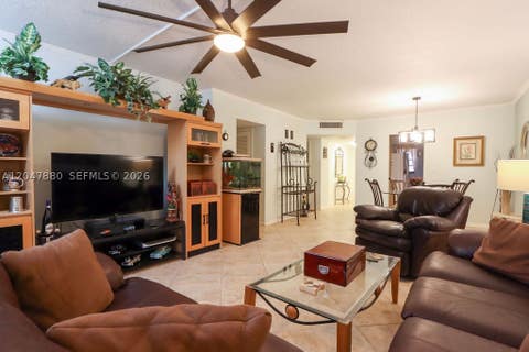 Photo of 3575 Broken Woods Dr #303, Coral Springs, FL 33065 (MLS # A12047880)