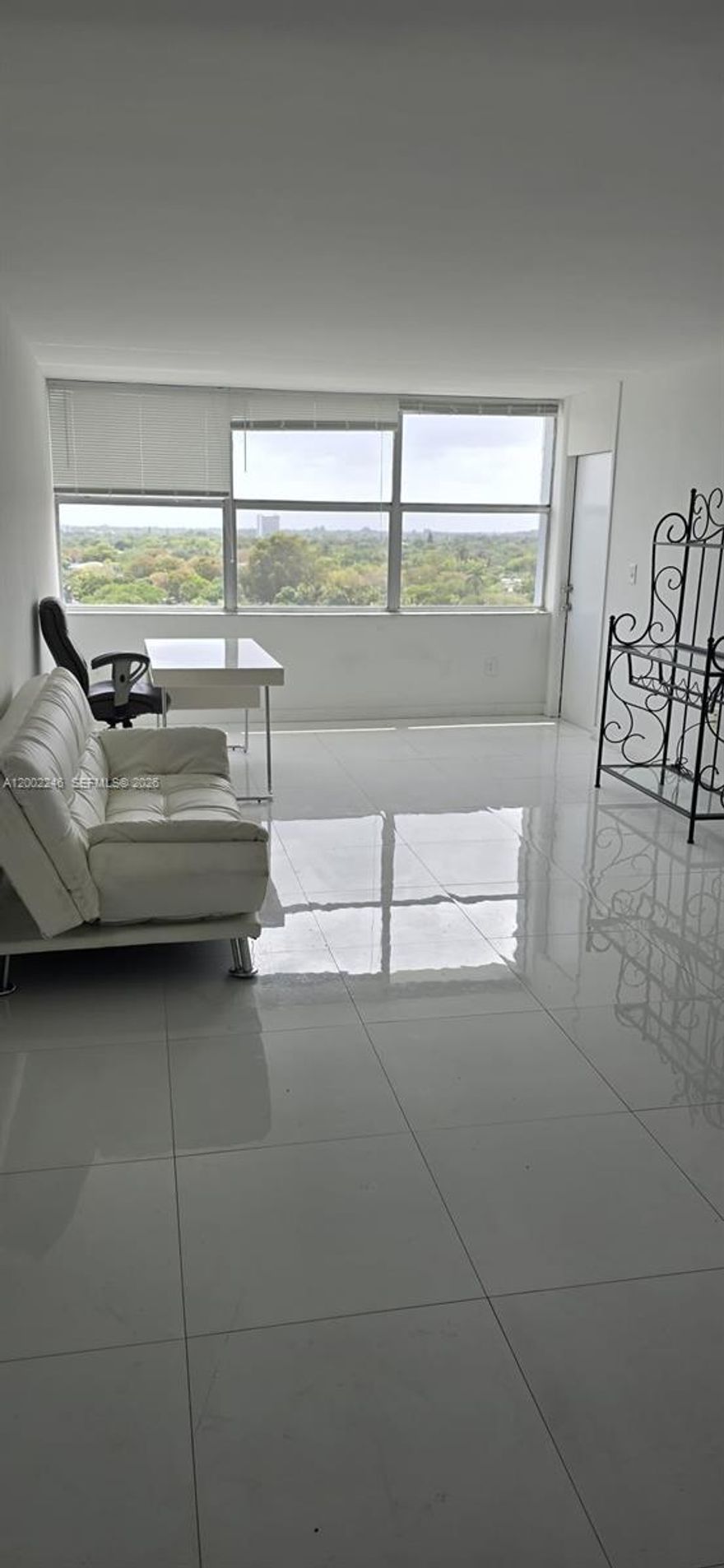 This 1-bedroom, 1.5-bath unit on the 10th floor of the Wilshire Condo in the heart of Miami Gardens. This home is filled with natural light, spacious kitchen, has tile floors throughout, and features a private balcony perfectly made for morning coffee or evening unwinding.   You’ll also love the extra storage, including a walkin closet.  There is also plenty of guest parking, ensuring there’s always room for a second car. The location is also excellent, just 5 minutes from the I-95 exit and only a 10-minute drive to Aventura Mall. Skylake Mall is only 0.7 miles away and offers a large Publix, LA Fitness, T.J. Maxx, The home is also zoned for the highly desired A-rated Ojus Elementary School.  Available Now!!!