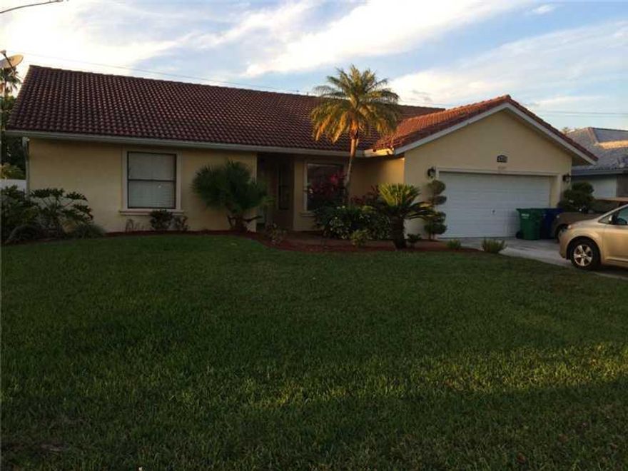 Beautiful 4/2 spacious home. A MUST SEE! Totally upgraded. Freshly painted. Crown molding. Remodeled kitchen with granite countertops and stainless steel appliances. Remodeled bathrooms with jacuzzi in master bath. Pool with child safety fence. RENT WORRY -FREE! Available May 15th!