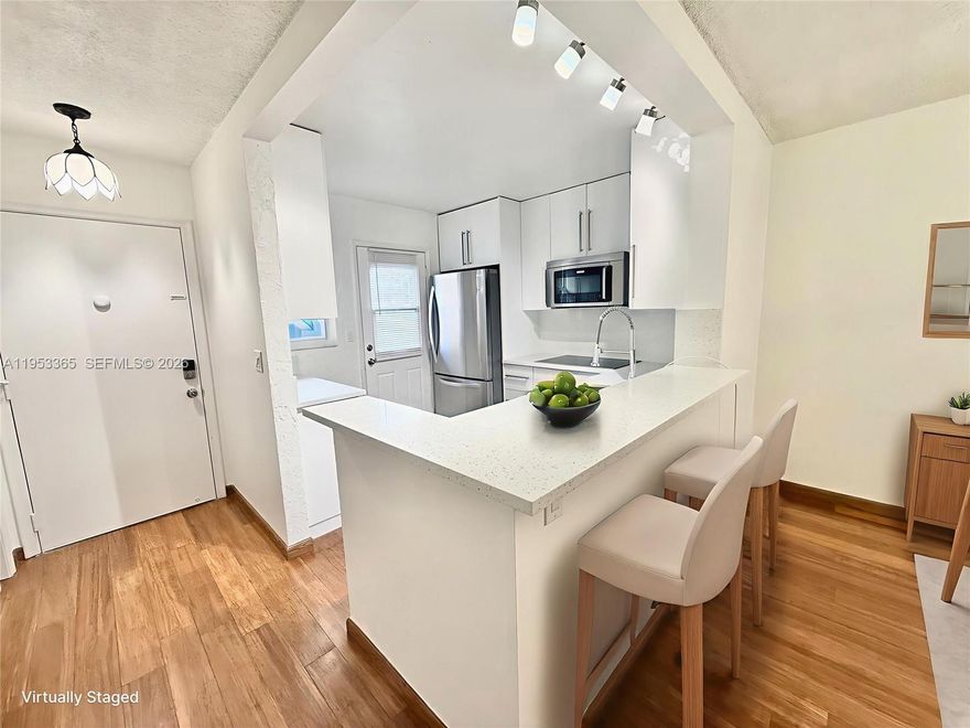 Beautiful renovated 1 Bed / 1 Bath condo with a small den, ideal for a home office or studio, located on the first floor in the heart of Hallandale Beach. Prime location just minutes from Hallandale Beach, Gulfstream Park & Casino, Aventura Mall, and Hollywood Beach Broadwalk. Easy access to US-1, I-95, and major roads. Close to shopping plazas, supermarkets, restaurants, cafes, banks, and public transportation. Quiet community with convenient ground-floor access—no stairs. Ideal for tenants seeking comfort, accessibility, and a central South Florida location. Move-in ready!
