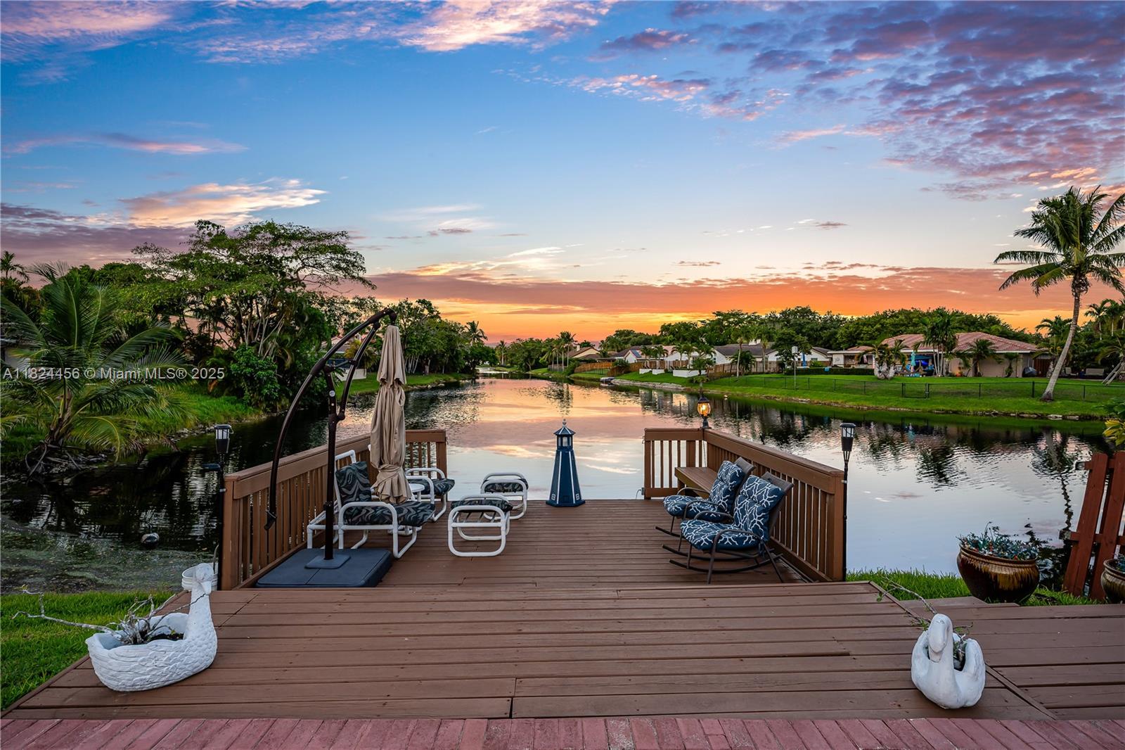 PREMIUM LOT WITH BREATHTAKING LAKE VIEWS IN SOUGHT AFTER JACARANDA LAKES **FABULOUS ONE-STORY HOME FEATURING 5 BEDROOMS & 3 BATHROOMS –OPEN CONCEPT LAYOUT WITH SPACIOUS LIVING AREA **AMPLE MASTER SUITE W/ VAULTED CEILINGS & MODERN EXPANDED MASTER BATHROOM **UPGRADED KITCHEN WITH WOOD CABINETRY, GRANITE COUNTERTOPS, STAINLESS STEEL APPLIANCES AND BREAKFAST ROOM **SPECTACULAR BACKYARD W/ A FREE FORM SOLAR HEATED POOL, LARGE DECK, EXTENDED COVERED PATIO ** BEAUTIFUL PEACEFUL AND RELAXING MANICURED GARDEN, PERFECT FOR OUTDOOR ENTERTAINING WHILE ENJOYING AMAZING VIEWS **FRUIT-BEARING MANGO, AVOCADO & PINEAPPLE TREES ** ACCORDION SHUTTERS THROUGHOUT **GREAT COMMUNITY WITH VERY LOW ASSOCIATION! DON'T MISS THE OPPORTUNITY TO OWN THIS EXCEPTIONAL LAKEFRONT PROPERTY IN THE HEART OF PLANTATION!