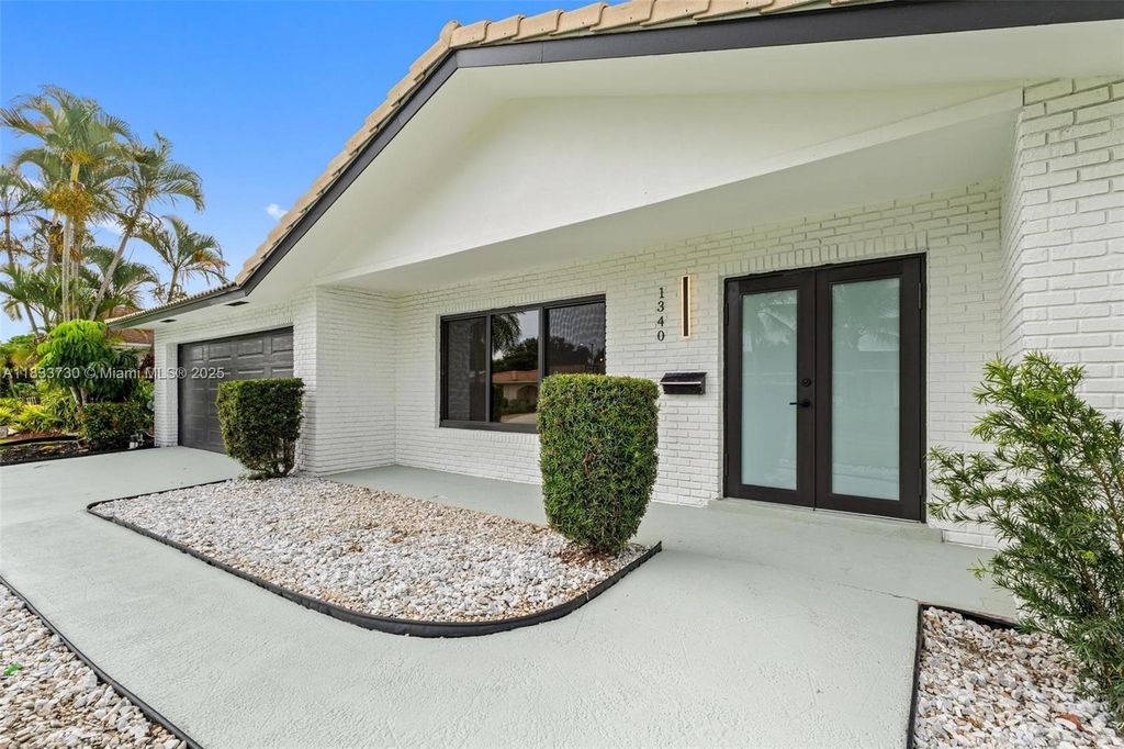 Photo of 1340 SW 27th Pl, Boynton Beach, FL 33426 (MLS # A11833730)