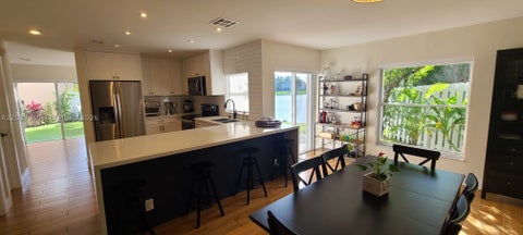 Photo of 320 SW 99th Ave, Pembroke Pines, FL 33025 (MLS # A12033969)