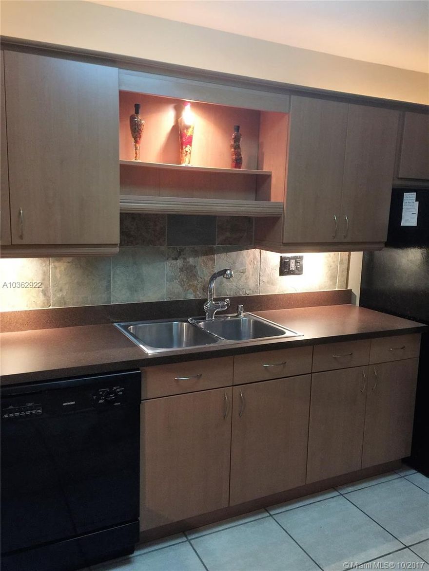 You will fall in love with this condo located in North Miami, close to intra coastal and beaches, restaurants, gyms and major shopping centers.  Unit features updated kitchen and bathroom. A/C is only 2yrs old. Large living room with enough space to use as a home office. Separate Dining room. Two closets in bedroom, one a large walk in. Extra large bedroom, so cozy it feels like a hotel room. Building is gated and has a pool. Walking distance to Walgreens, Whole Foods, future Starbucks and more. Balcony views. Not to miss.  .