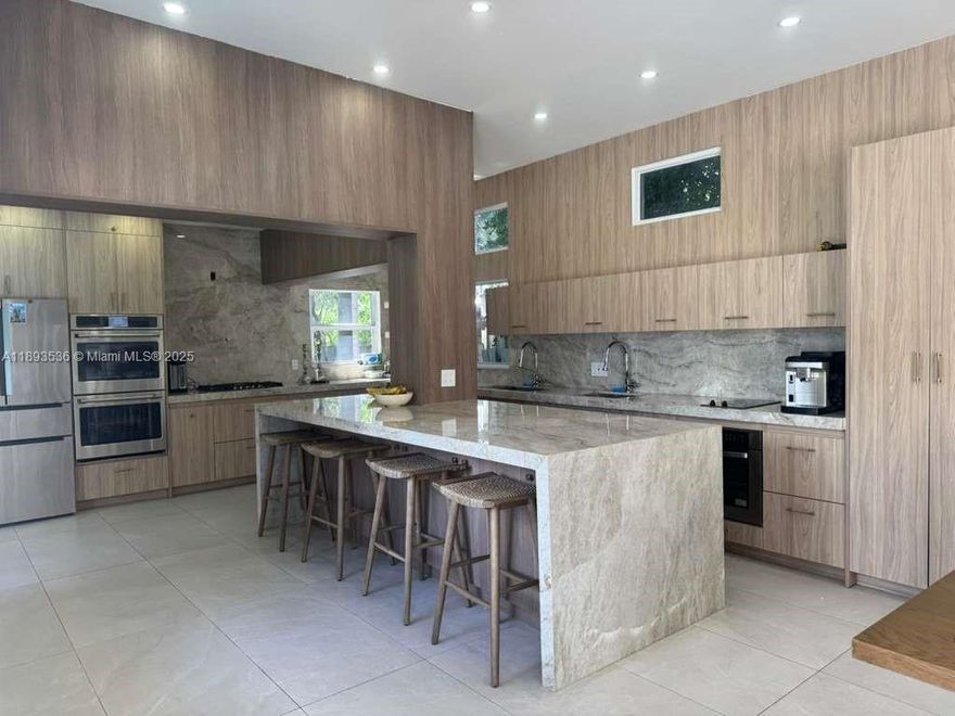 Welcome to this spacious 5-bedroom, 4-bathroom home located at 1333 Monroe St in Hollywood, FL. This stunning property boasts a modern kitchen with stainless steel appliances, granite countertops, and ample cabinet space. The open floor plan includes a large living room, perfect for entertaining guests. The master suite features a walk-in closet and en-suite bathroom with a luxurious soaking tub. Enjoy the Florida sunshine in the backyard oasis, complete with a sparkling pool and lush landscaping. This home is conveniently located near shops, restaurants, and parks, making it the perfect place to call home.