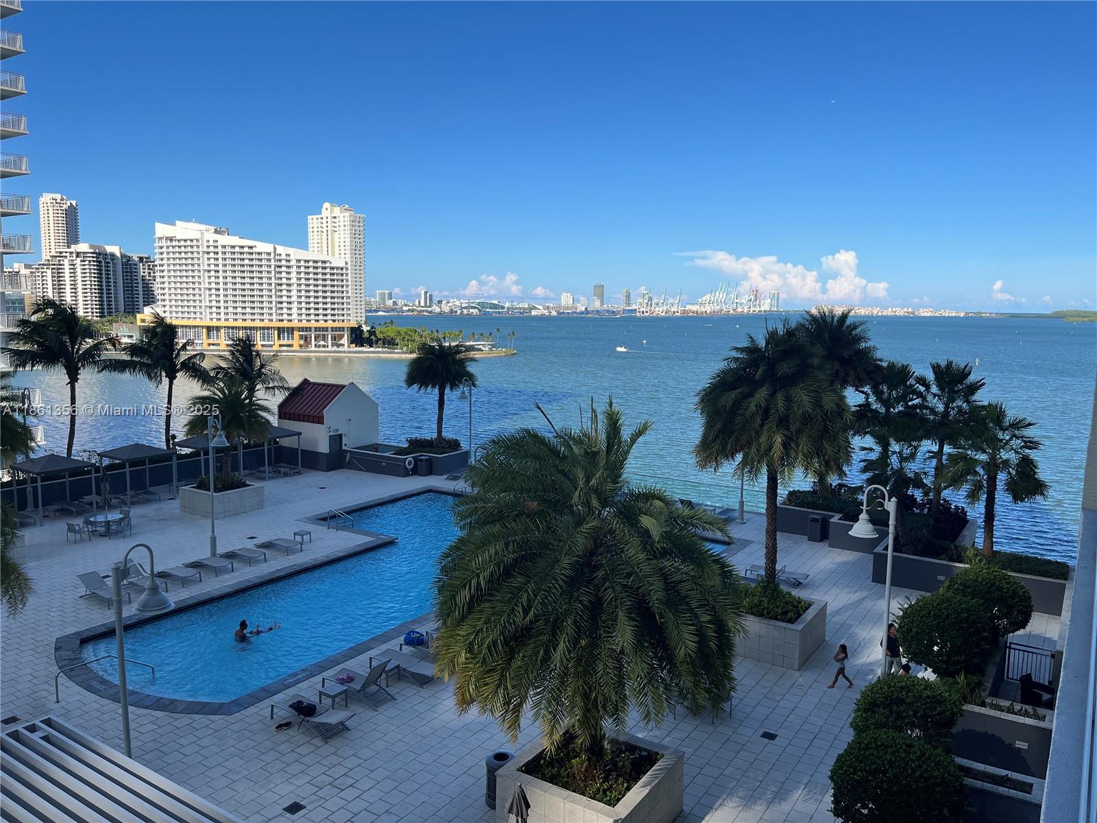 Beautiful and spacious 3 bedroom 2 bathroom apartment in The Mark, located in the heart of Brickell at Biscayne Bay. Split floor plan with laminate floors and spacious walk-in closets. Open kitchen with granite counter tops and stainless steel appliances. Washer and dryer inside unit. Balconies overlook bay and pool area. 1 assigned garage parking space. 24 hour concierge and amenities; pool, tennis, racquetball, gym and restaurant. Ready to move in. Quick association​​‌​​​​‌​‌​​​‌‌​​​‌‌‌​​‌​​‌‌​​​​ approval.