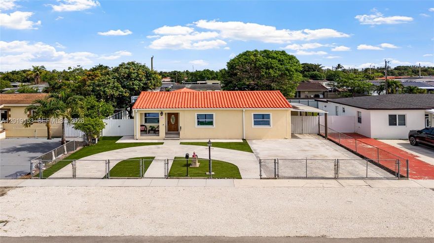 A completely renovated gem in Hialeah.  4 Bedrooms, 3 Full Bathrooms, Family room plus office.  Walk in  Closets & pantry, Full laundry room with sink.  Newly installed LED Recessed lighting throughout. Full impact windows and doors. Completely fenced in for privacy. Newly completed state of the art, outdoor kitchen with stone countertops and integrated gas cooktop, Whole house generator in place, to provide that extra security.  Two screened in terraces, including parking for 10 vehicles.  Floor plan easily accommodates two families. *Please see Matterport Tour link below.