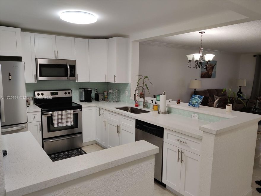 Totally remodeled, turnkey 2 bedroom 2 bathrooms in the heart of Hallandale Beach in one of the nicest buildings in Meadowbrook. The property is on the first floor, with an easy access. Parking spot is in front of the unit. Open kitchen with tile floors throughout with enclosed large porch that opens view of the club house, garden. Unit has newer AC, new water heater, newer appliances, impact windows and accordion shutters. Building has new roof and no pending assessments at this time. Amazing location: Close to the Beach, Gulfstream & shopping. Close to restaurants & supermarkets. All ages community. Great opportunity, move in ready!