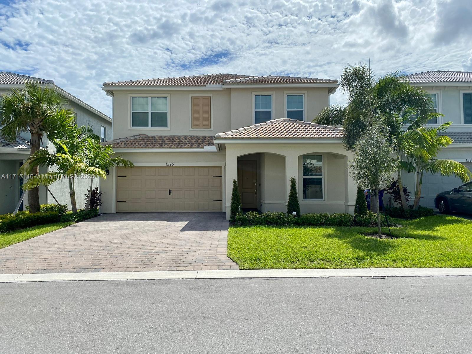 Located in the prestigious gated community of Parkview at Hillcrest, this turn-key home features an open floor plan with stunning lake views. The kitchen flows into a spacious living room, perfect for entertaining and creating flexible spaces. Upstairs, there are three bedrooms with built-out custom closets, as well a loft that can be converted into a fourth. The backyard is fenced in with a children’s swing set and ample space to enjoy!
Parkview at Hillcrest offers resort-style amenities, including an Olympic sized pool, walking trails, fitness center, tennis courts, and more. The home is conveniently located just minutes from I-95, dining, and shopping. HOA approval required. Don’t miss out!