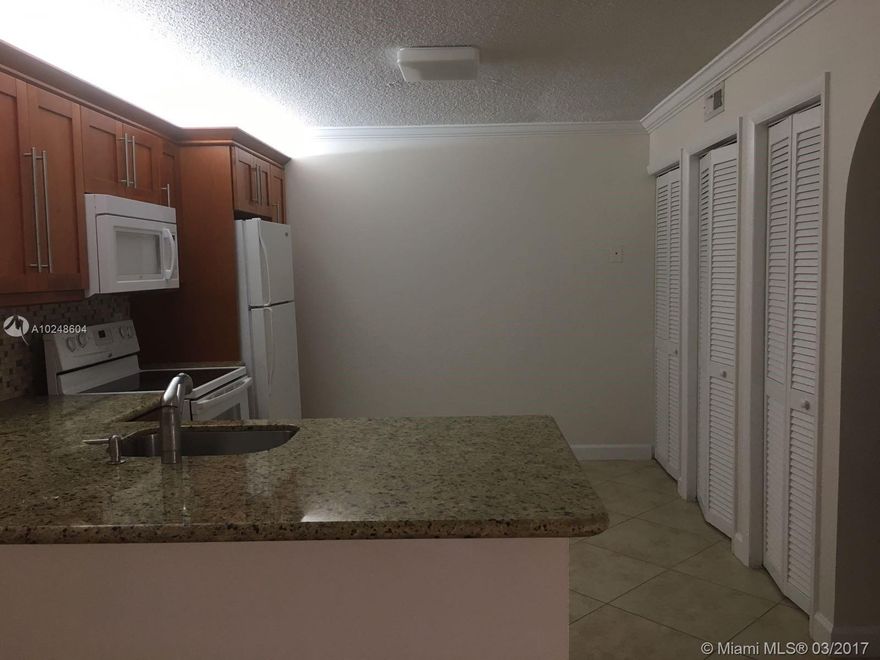 This a well maintained unit at Grand Marquis Condominium, recently painted unit, kitchen, bathroom and bedroom tastefully remodeled.