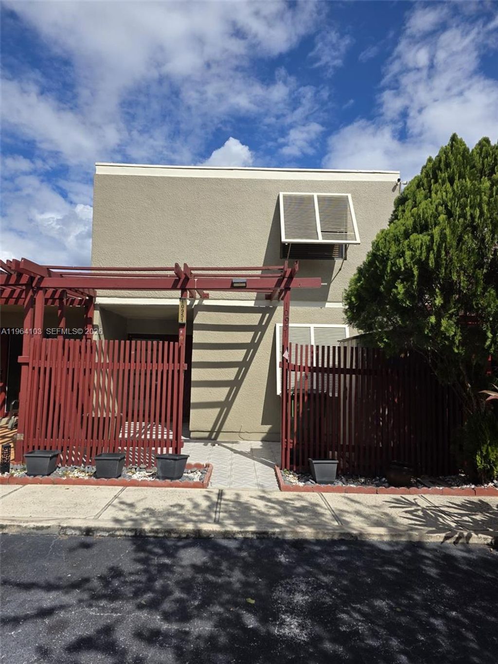 Photo of 10951 Cypress Rd #10951, Pembroke Pines, FL 33026 (MLS # A11964103)