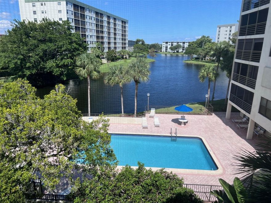 Beautifully REMODELED 2br/2bth condo in nice family & pet friendly neighborhood. Custom Build kitchen cabinets w/ QUARTZ countertop, Central A/C, tile floors, walk-in closet master bedroom, NO POPCORN CEILINGS! Open-concept floor plan. Front row parking spot. Laundry facilities on same floor. Resort style living year round with everything this community has to offer. Enjoy heated pools, sauna, grilling area, clubhouse, billiard room, fitness room, tennis courts, pickleball & more! There is also a 1 1/2 mile walking/biking path around entire community. Walking distance to pharmacy, grocery stores, shopping, and conveniently located near I-95, Turnpike, the beach and just a few blocks from the new Harrah's casino. (No age restrictions; Water included maintenance)