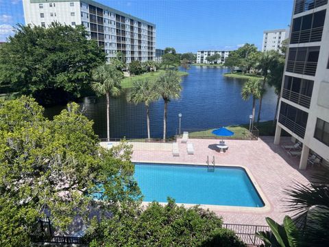 Photo of 2307 S Cypress Bend Dr #406A, Pompano Beach, FL 33069 (MLS # A11892718)