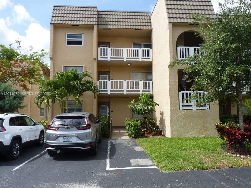 Photo of 9241 Sunrise Lakes Blvd #201, Sunrise, FL 33322 (MLS # A12011079)
