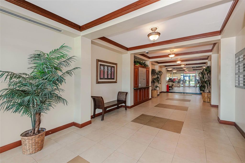 Photo of 5599 S University Dr #205, Davie, FL 33328 (MLS # A12018368)