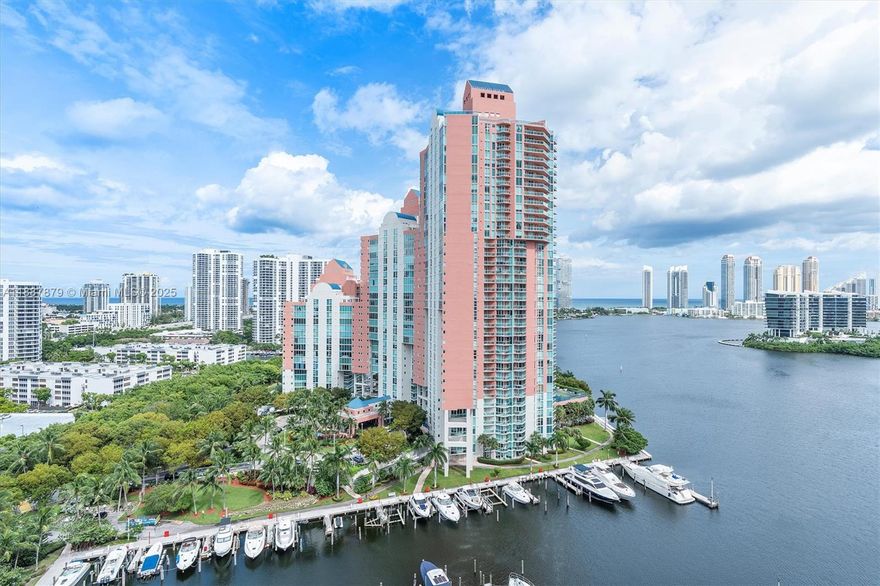 Stunning 2-story corner penthouse with panoramic views of the ocean, Intracoastal & Sunny Isles skyline. Over 2,497 SF interior plus 1,000 SF terrace for outdoor living. Features 12 ft ceilings, wood & porcelain floors, open kitchen, walk-in closets, laundry room, and large storage. Exclusive gated community with marina, walking paths, spa, gym, 2 pools, 4 tennis courts, concierge, valet & 24-hr security. Includes 2 garage spaces. Prime Aventura location.