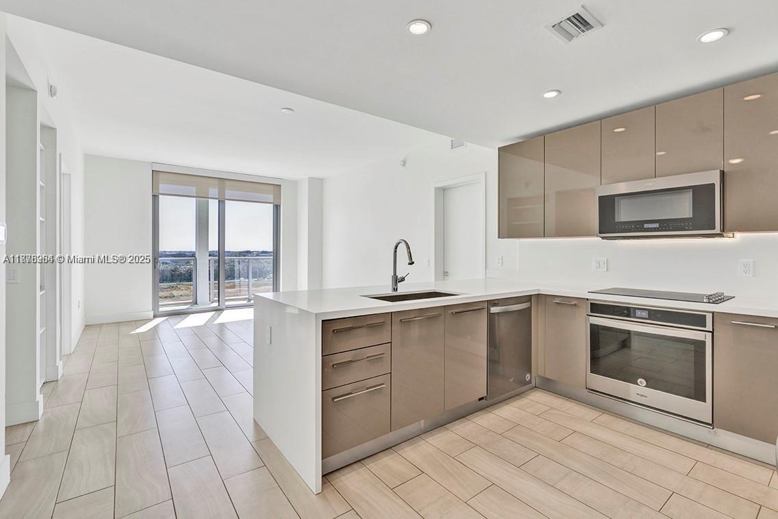 Experience the life of luxury! newly built- *Metropica* features a desirable convenient location next to sawgrass mills offering 400 stores, restaurants & services. highlights of this spacious, comfortable 2 bed-2 baths unit include designer kitchen w/ stainless steel appliances, premium cabinetry, quartz countertops and backsplash, porcelain tile floors, impact resistant uv protected windows, led lighting w/ upgraded switches, washer/dryer in unit, large terrace w/glass railings accessible from living areas. Metropica is pet friendly and high-end amenities include bbq/picnic area, business center, clubhouse-clubroom, fitness center, heated pool, child play area, sauna, & tennis courts.