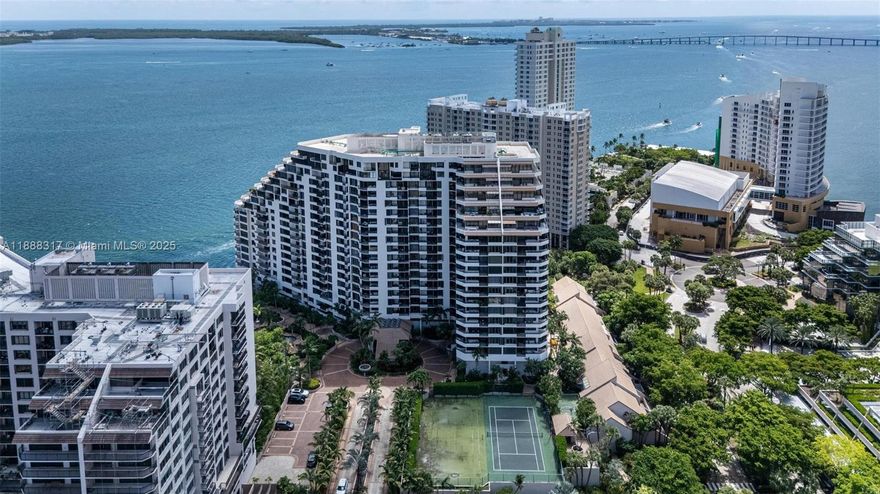 Welcome to the coveted Brickell Key One Building. This beautifully renovated 2 bed/2 bath residence overlooks the tennis courts and features new floors, bathrooms, kitchen, lighting, electrical, and appliances. Enjoy resort-style amenities including 24-hr security, concierge, valet, pool, tennis, gym, sauna, racquetball, billiards, kids’ playroom, and more. The island lifestyle offers waterfront parks, walking paths, dining, a market, coffee shop, and salon. With in-unit washer/dryer, covered parking, and guest valet, all just steps from Brickell City Centre, fine dining, and transit—this home is the perfect blend of privacy, luxury, and convenience in the heart of Miami. Unit comes with one assigned parking space, complimentary guest valet parking & a storage unit.