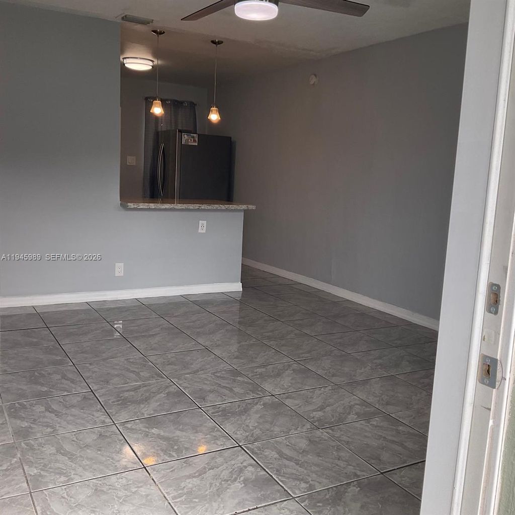 Photo of 337 Phippen Waiters Rd #1-2, Dania Beach, FL 33004 (MLS # A11945989)