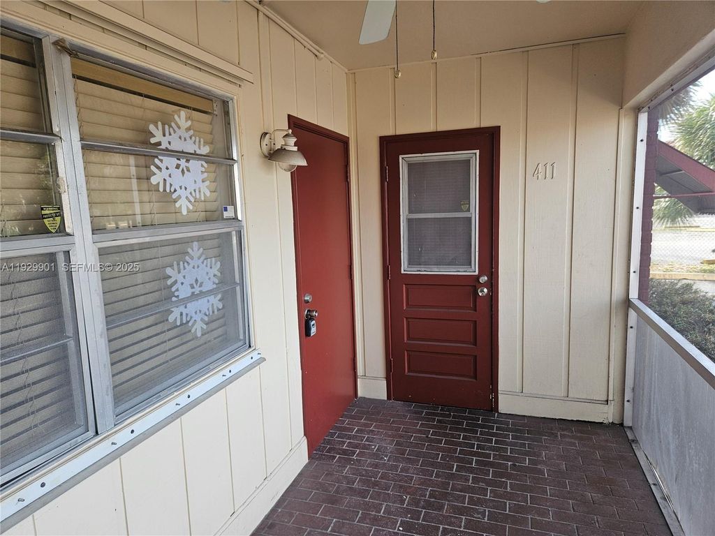 Photo of 2041 NW 81st Ave #411, Pembroke Pines, FL 33024 (MLS # A11929901)