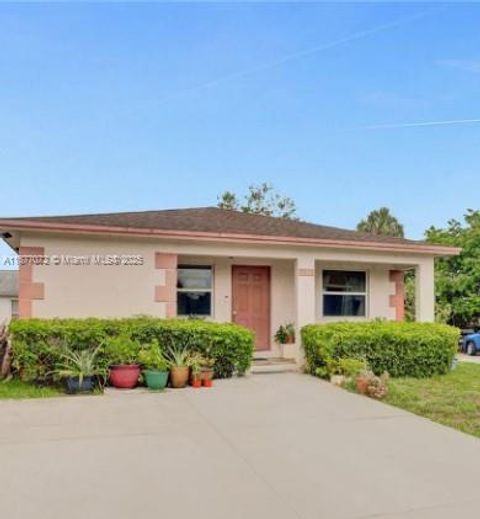 Photo of 2229 NW 24th Ct, Fort Lauderdale, FL 33311 (MLS # A11877072)