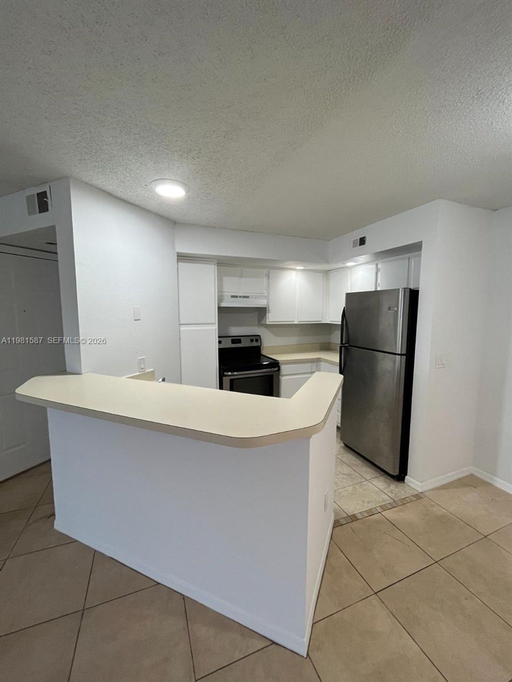 Photo of 1401 Village Blvd #128, West Palm Beach, FL 33409 (MLS # A11981587)