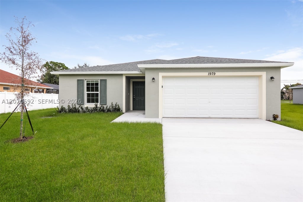 Photo of 1979 SW Beekman St, Port St Lucie, FL 34953 (MLS # A12079692)