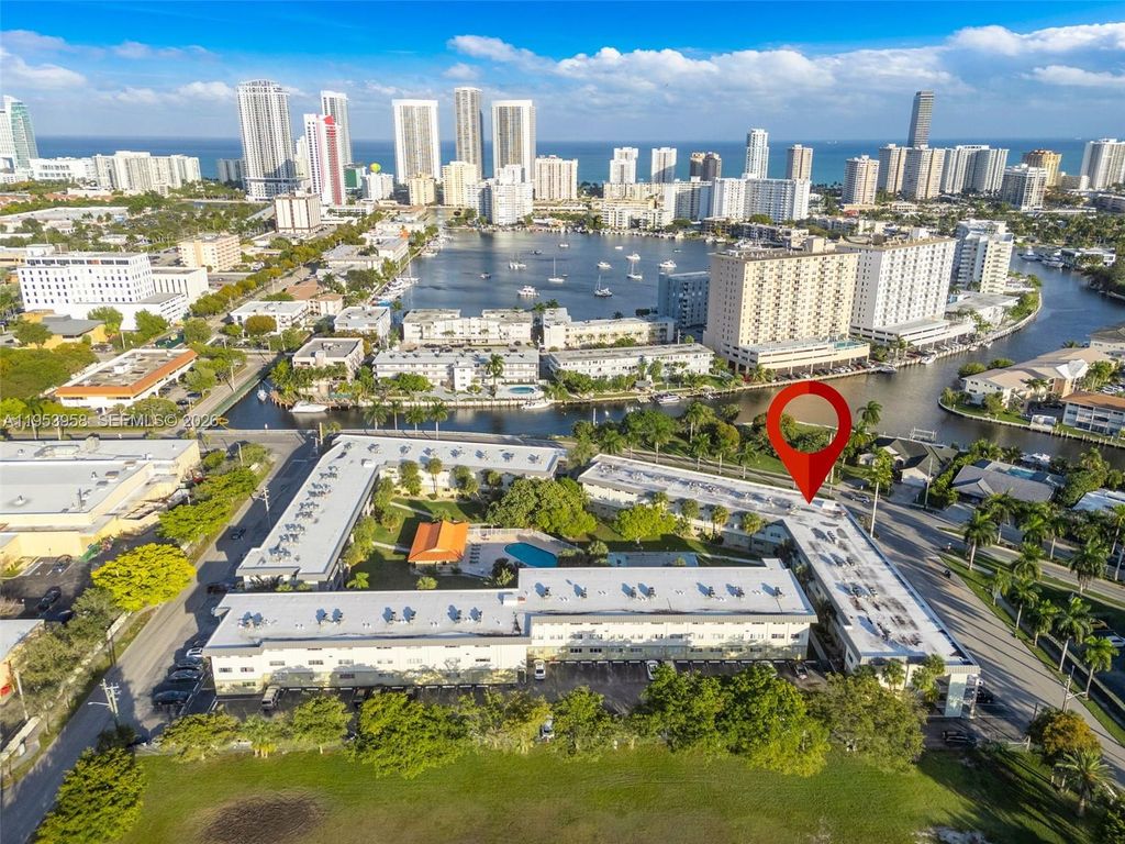 Photo of 300 Layne Blvd #212, Hallandale Beach, FL 33009 (MLS # A11953958)